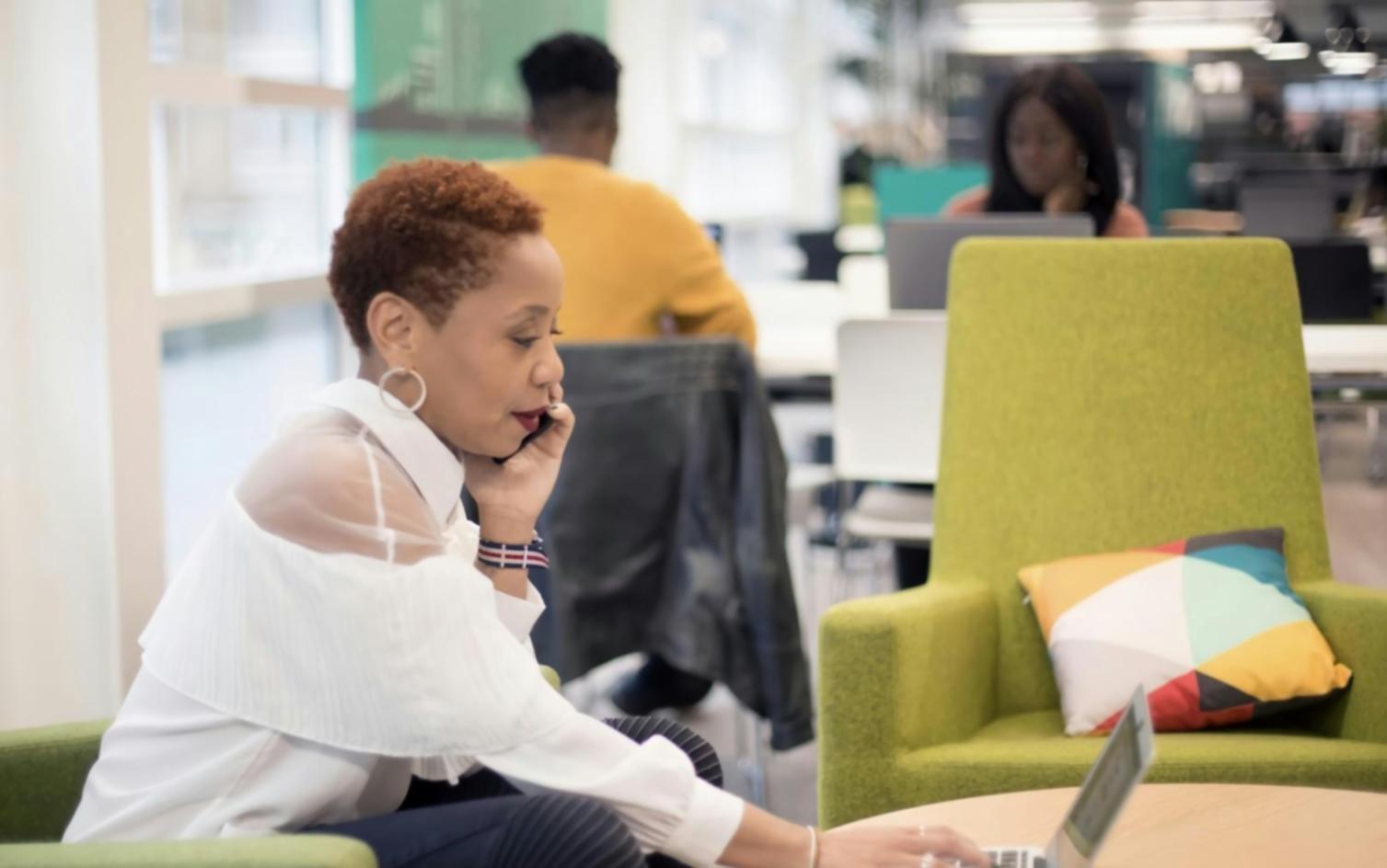 Modern office workspace with computers and collaborative learning environment